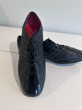 Amalfi Black Quilted Lace-Up Flats with Red Lining